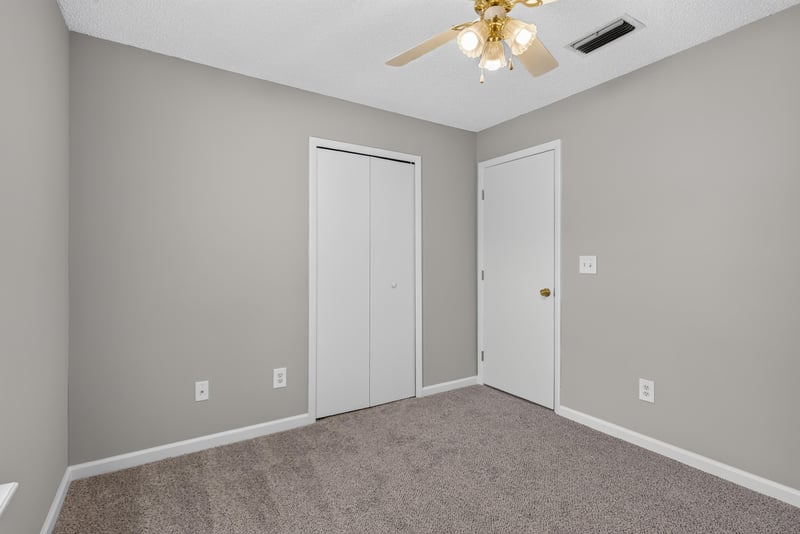 Bedroom closet area with carpet at 1108 Hidden Cove Cir S, Atlantic Beach, FL 32233