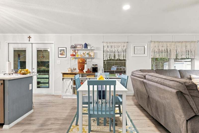 Open living and dining space, photographed by Megapixeler on Secret Cove Rd, Middleburg, FL