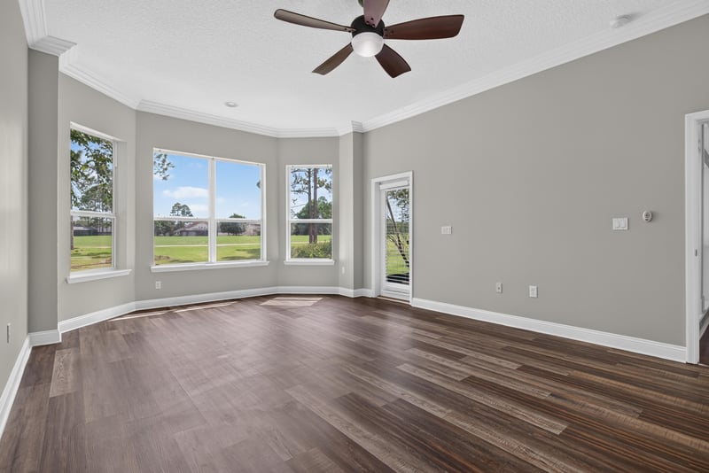 Sitting room with wood floor and windows at 4109 Eagle Landing Pkwy, Orange Park, FL 32065