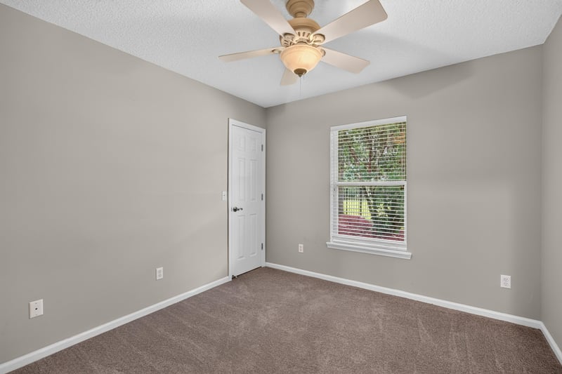 Empty bedroom with carpet at 1955 GUARDED Way, Fleming Island, FL 32003