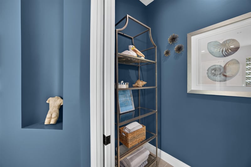 Bathroom shelving nook with decorative accents at 140 Ave De La Mer, Palm Coast, FL 32137