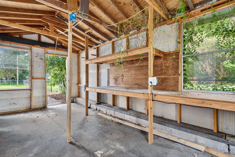 Shed interior with open framing and window at 4565 Appleton Ave, Jacksonville, FL