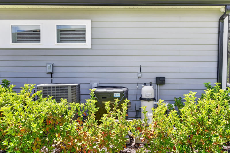 Exterior HVAC unit along the side of the home at 785 Back Creek Dr, St. Augustine, FL 32092