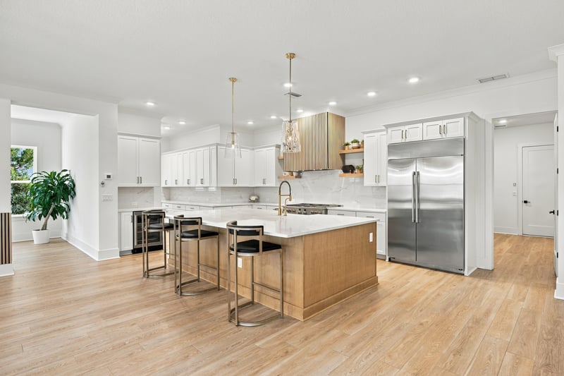 Kitchen with island seating and stainless appliances at 907 Seagrove Dr, Ponte Vedra Beach, FL 32081