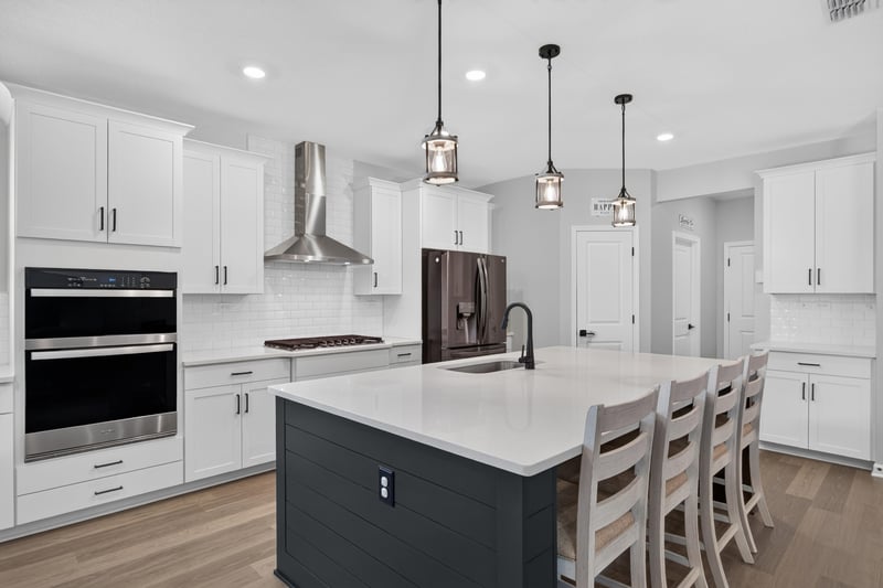 Kitchen with stainless range hood and pendant lighting at 2354 Jennings Farm Dr, Middleburg, FL 32068