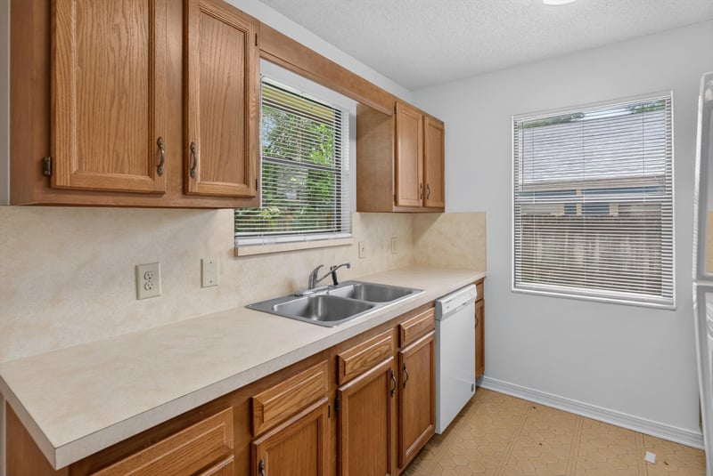 Kitchen sink with dishwasher at 1445 Classic Oak Rd W, Jacksonville, FL