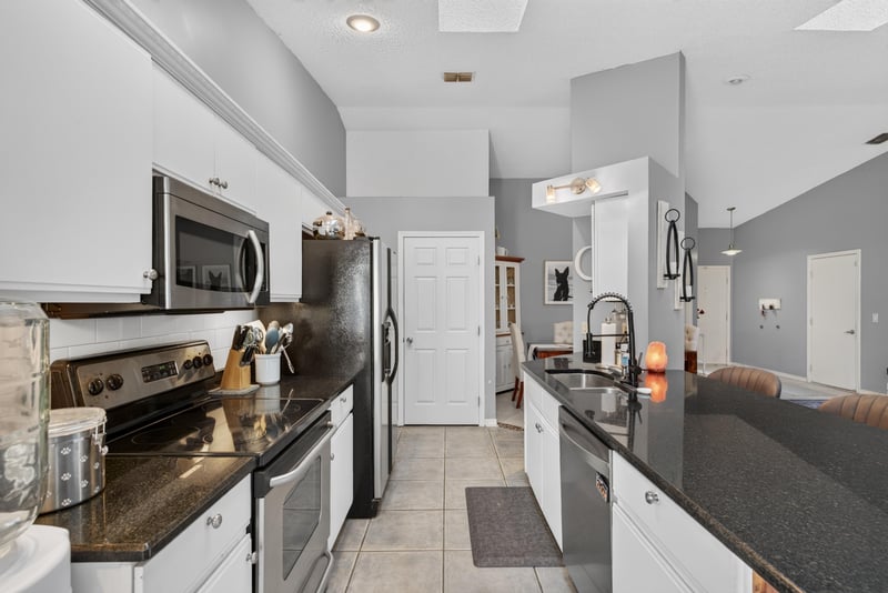 Kitchen with range and microwave at 13020 Medford Ln, Jacksonville, FL 32225