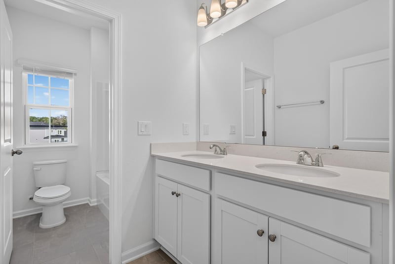 Bathroom toilet and window at 269 Bluegrass Wy, St. Augustine, FL 32092