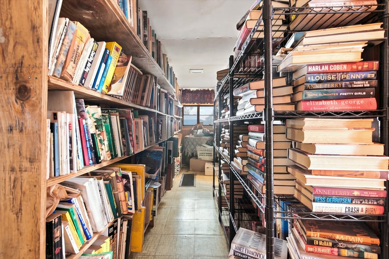 Narrow room lined with bookshelves at 1807 Idlewild Ave, Green Cove Springs, FL