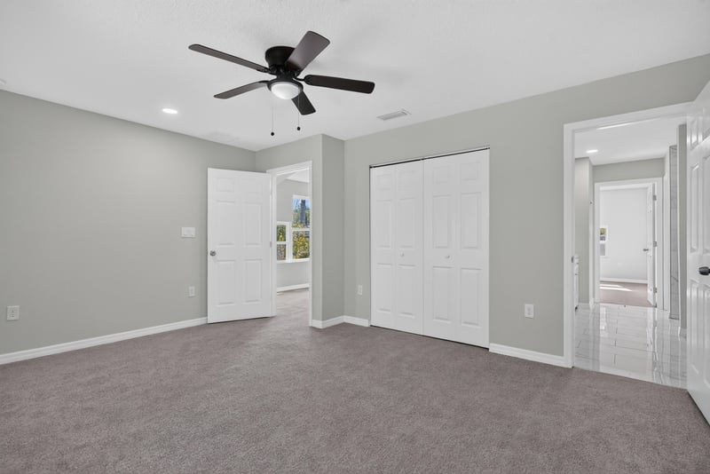 Bedroom with hallway doors, photographed by Megapixeler on Lem Turner Rd, Jacksonville