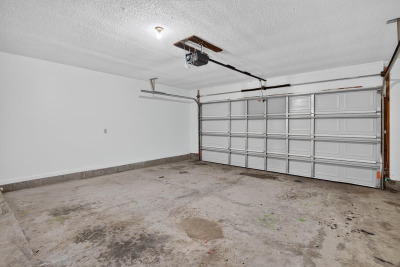 Garage interior with garage door at 4427 Millstone Ct, Jacksonville, FL