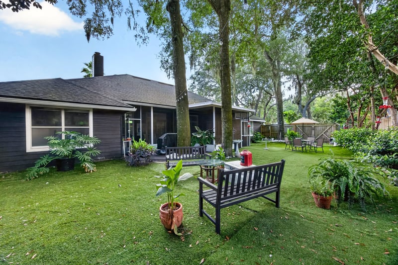 Screened porch and dark exterior siding at 1346 Gately Ct, Jacksonville, FL 32225