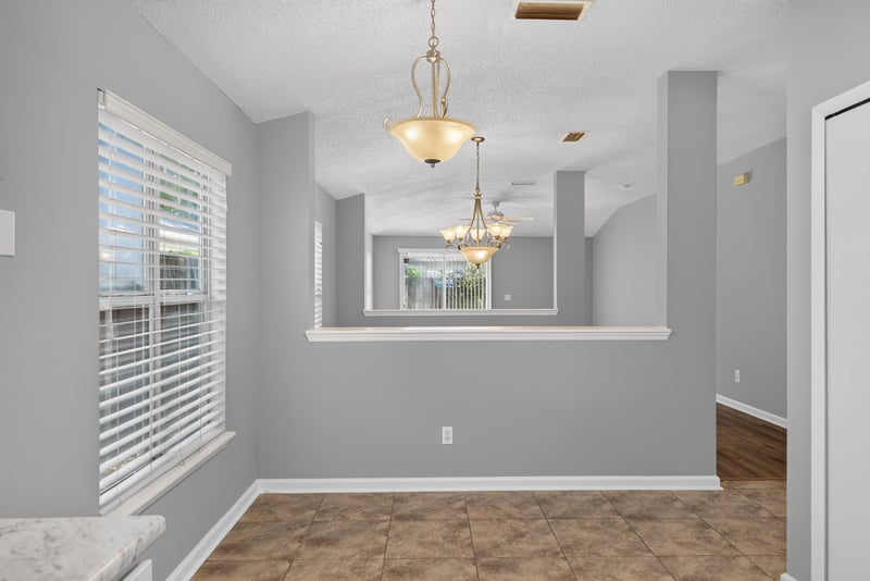 Dining nook with pass-through to kitchen at 1108 Hidden Cove Cir S, Atlantic Beach, FL 32233