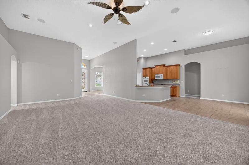 Kitchen opening into the living room at 635 Wakeview Dr, Orange Park, FL 32065