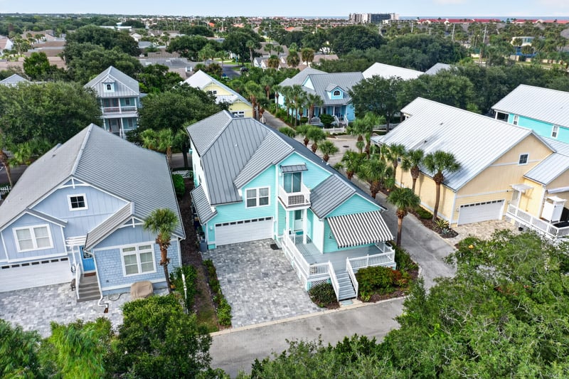 Aerial view of the home and street at 117 Island Cottage Way, St. Augustine, FL 32080