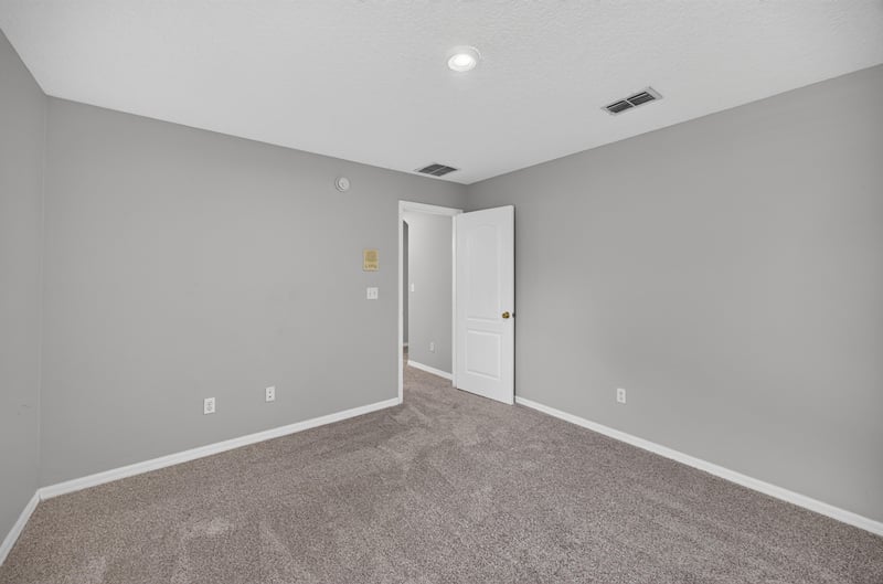 Bedroom with closet at 635 Wakeview Dr, Orange Park, FL 32065