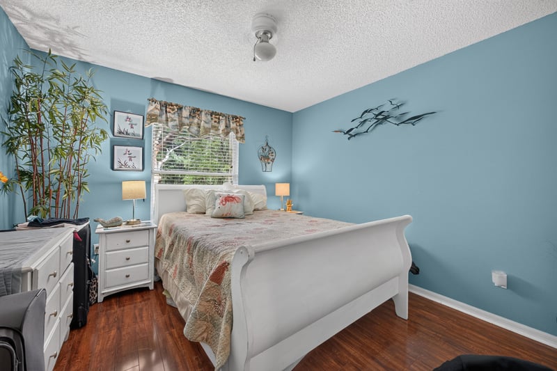 Bedroom with white furniture and window at 145 Dover Bluff Dr, Orange Park, FL