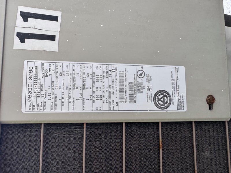 AC unit nameplate on condenser numbered 11 at 11700 New Kings Rd, Jacksonville, FL 32219