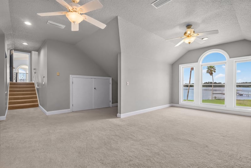 Empty room with staircase visible at 344 Broward Rd, Jacksonville, FL
