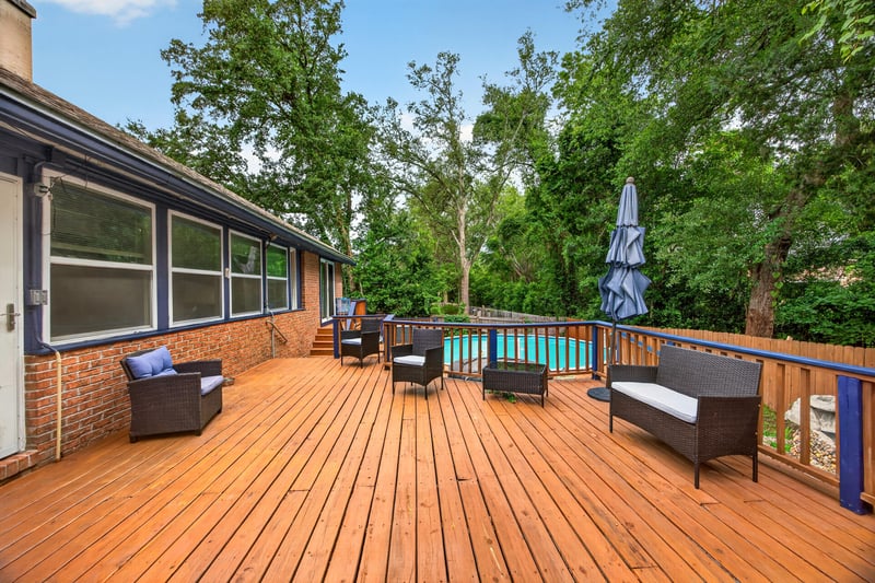 Screened porch with pool view and deck at 981 Marble Ridge Dr, Orange Park, FL 32065