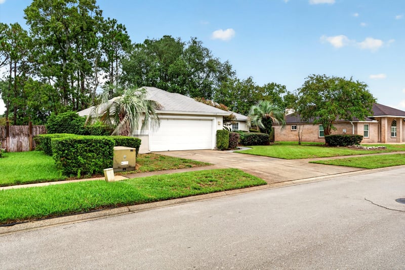 Front exterior view of the driveway at 12949 Chets Creek Dr S, Jacksonville, FL 32224
