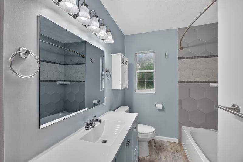 Bathroom, vanity mirror and shower at 2256 Inwood Cir S, Jacksonville, FL