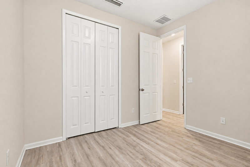 Closet doors along the hallway at 7088 Mahogany Run Dr, Jacksonville, FL 32244