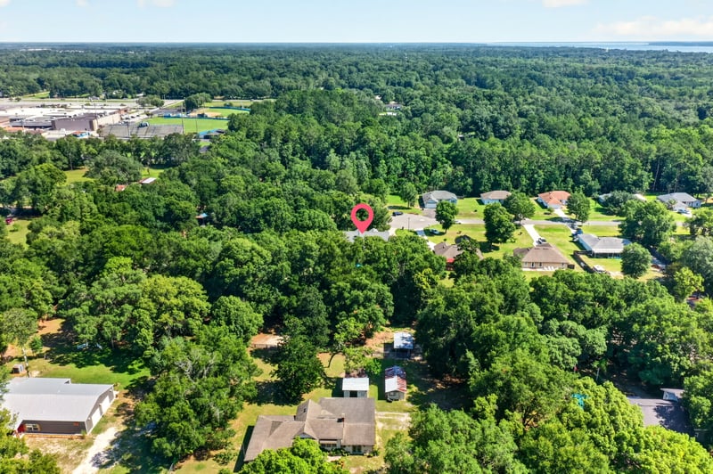 Aerial view of the wooded neighborhood in Green Cove Springs, FL