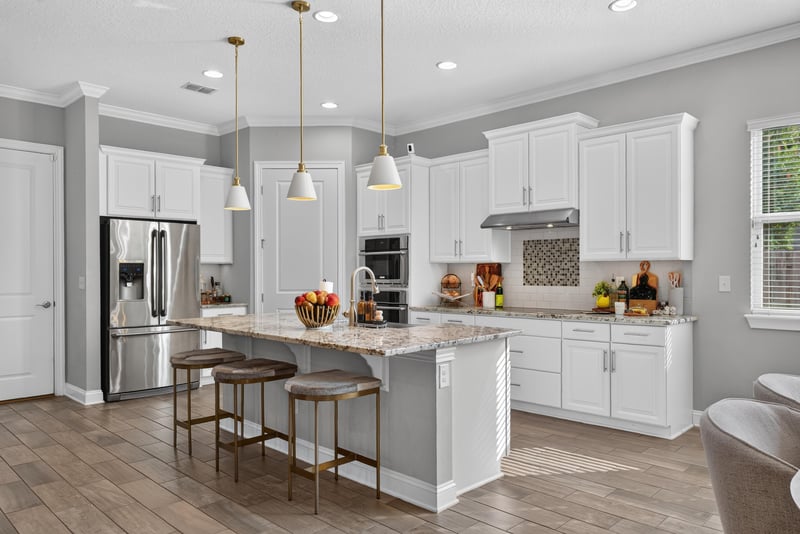 Kitchen with large island and pendant lighting at 3328 Southern Oaks Dr, Green Cove Springs, FL 32043