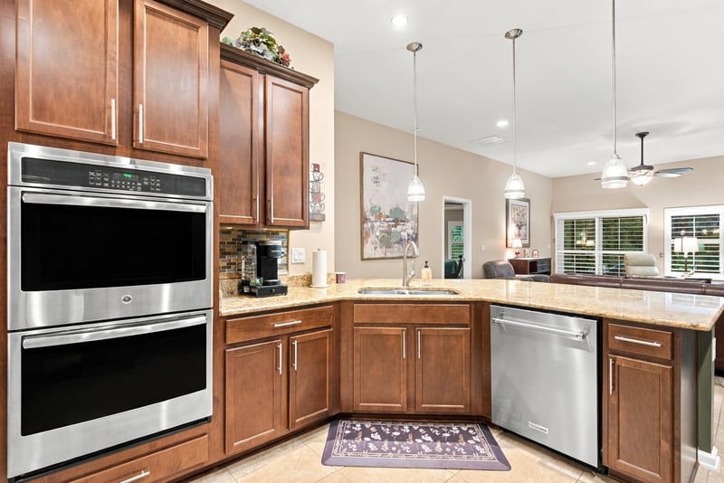 Kitchen with double ovens and coffee station at 10923 Black Diamond Ct, Jacksonville, FL