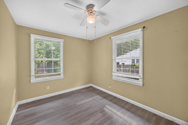Empty room with wood-look floors and windows at 2841 Ernest St, Jacksonville, FL 32205