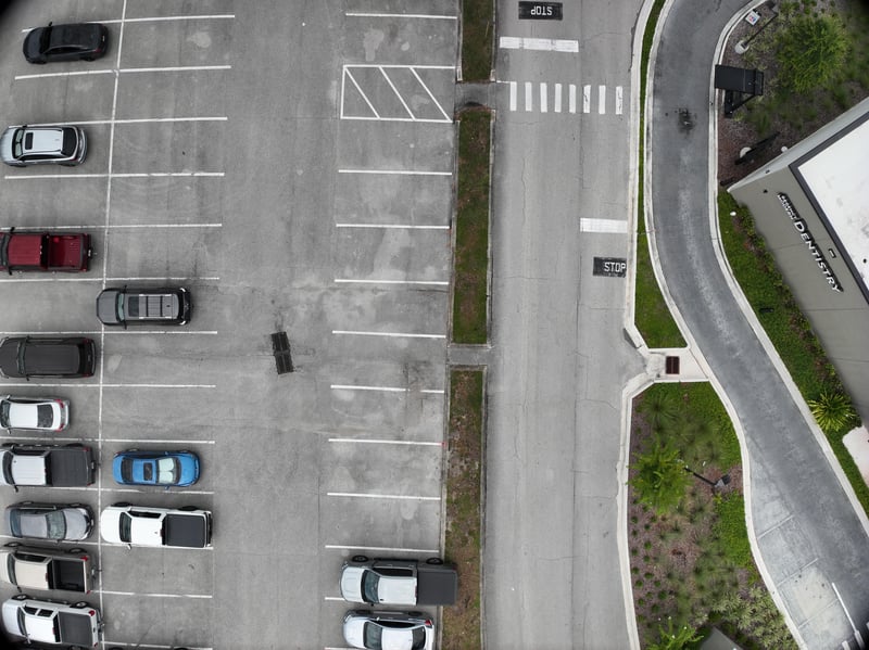 Aerial view of crosswalk and landscaped median at 9406 Atlantic Blvd, Jacksonville, FL 32225