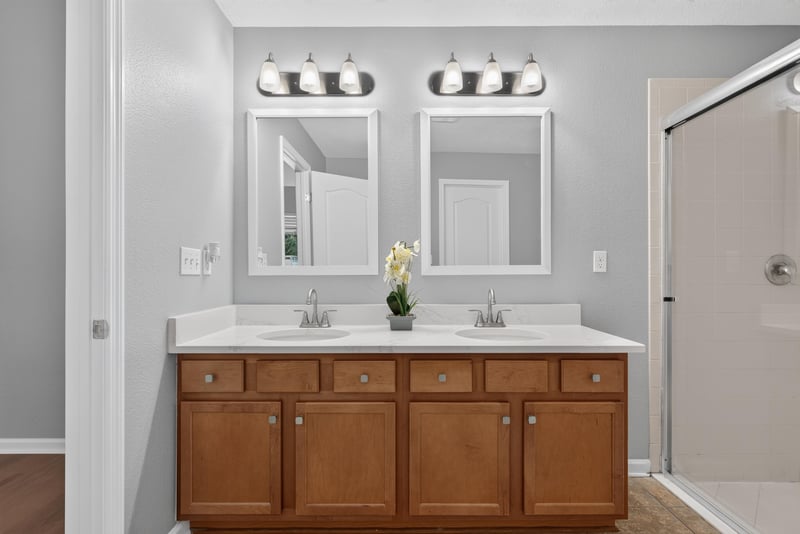 Bathroom with double vanity and shower at 706 Grampian Highlands Dr, St. Johns, FL 32259