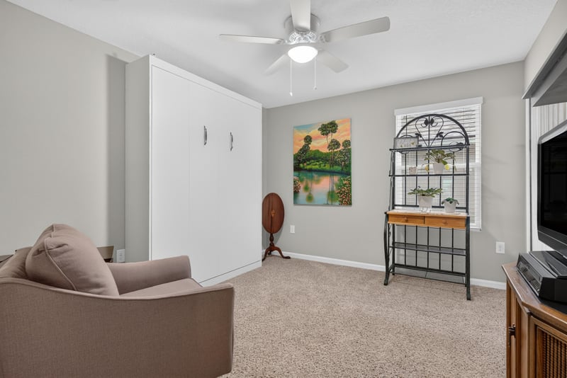 Bedroom with seating chair at 4319 Green River Pl, Middleburg, FL 32068