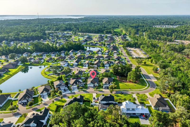 Aerial wide view of the lake and surrounding community in Green Cove Springs, FL