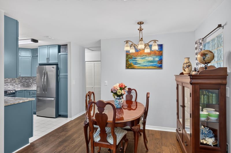 Kitchen pass-through with view to dining table at 10150 Belle Rive Blvd, Jacksonville, FL