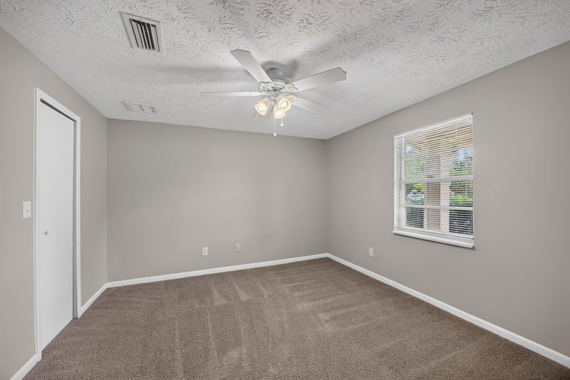Bedroom with window and carpet at 1143 Tumbleweed Dr, Orange Park, FL 32065