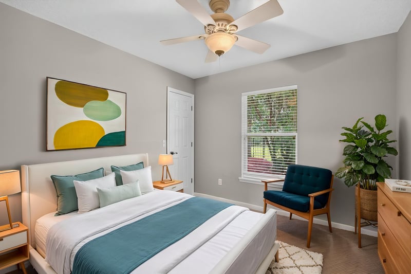 Bedroom furnished with bed and colorful art at 1955 GUARDED Way, Fleming Island, FL 32003