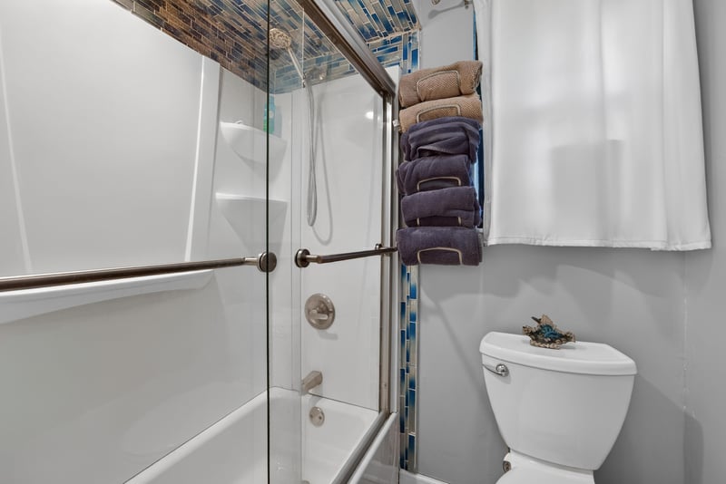 Bathroom with glass shower and soaking tub at 981 Marble Ridge Dr, Orange Park, FL 32065