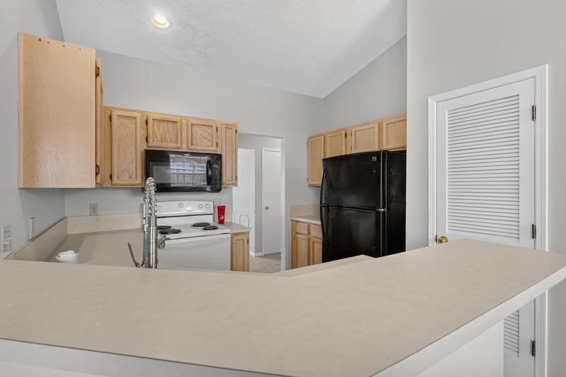 Kitchen counter with black appliances at 400 Ashcroft Landing Dr, Jacksonville, FL 32225