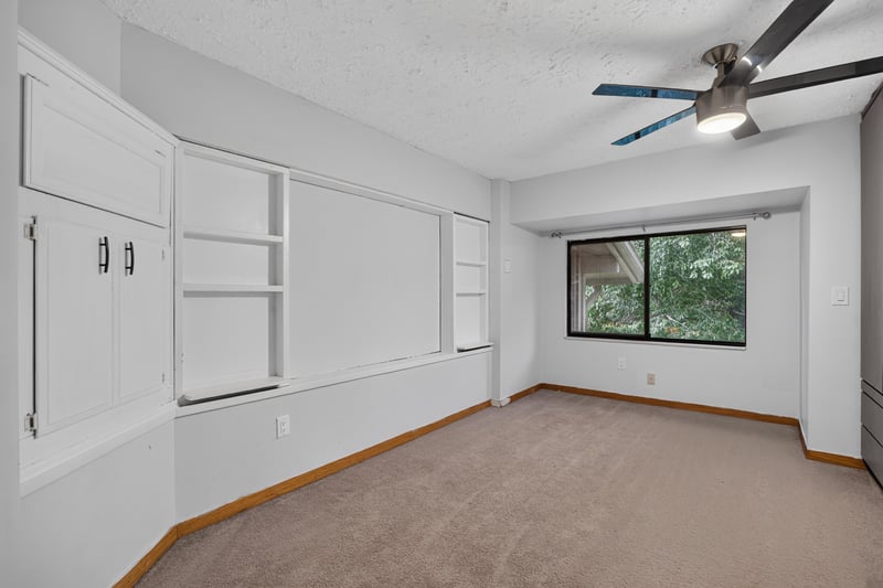 Bedroom with carpet and ceiling fan at 2910 Ravines Rd, Middleburg, FL 32068