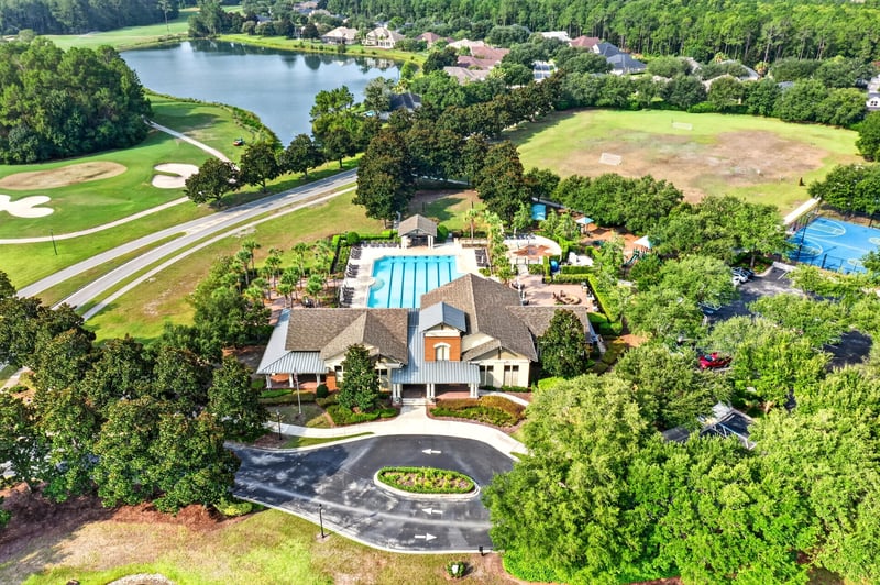 Drone view of home and pond-side golf course at 3101 E Banister Rd, St. Augustine, FL 32092