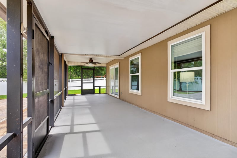 Screened porch along rear of home at 706 Grampian Highlands Dr, St. Johns, FL 32259