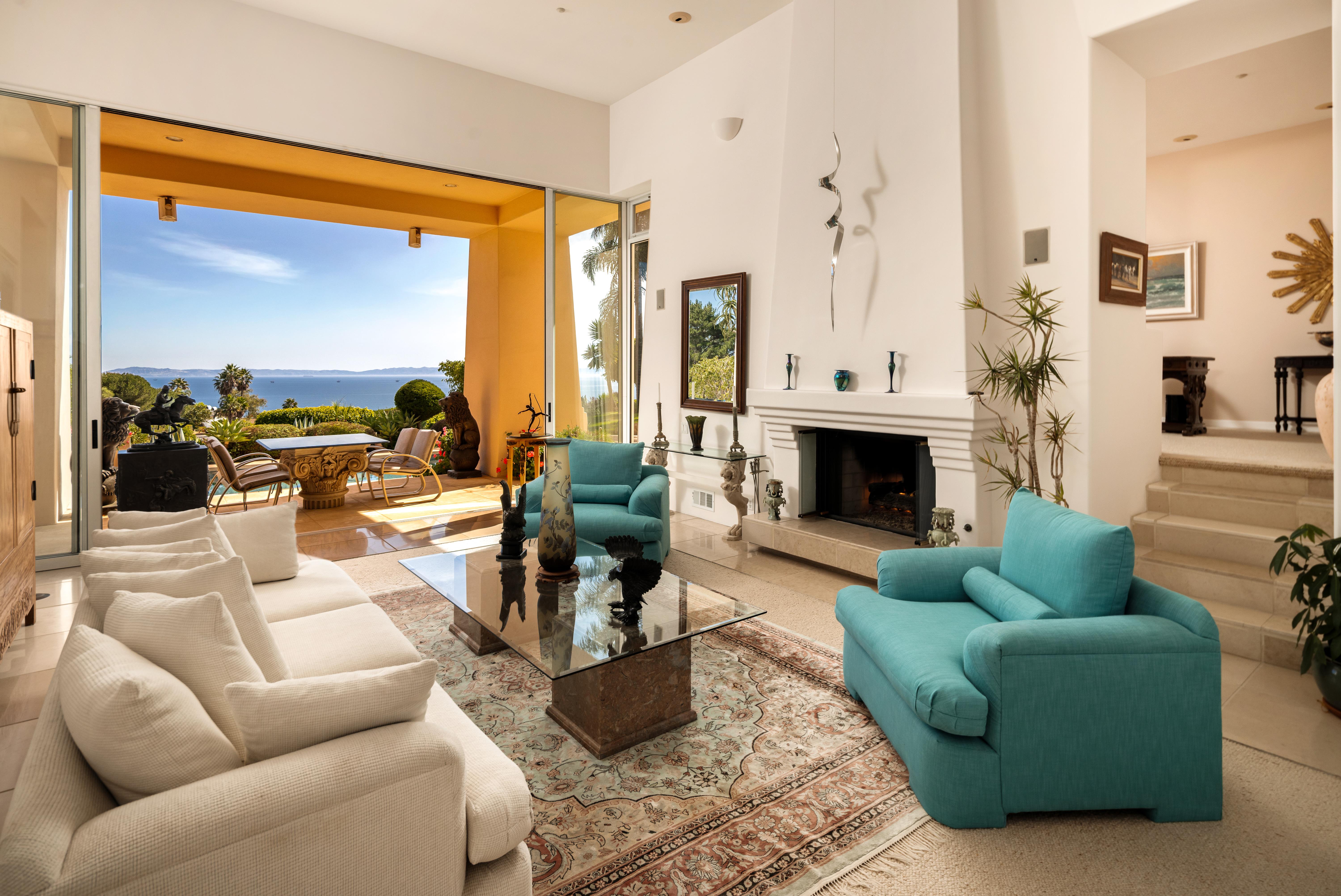 Aerial drone photography of 11 Hunt Drive Santa Barbara CA showcasing roofline and Montecito foothills beyond by VirTour Media