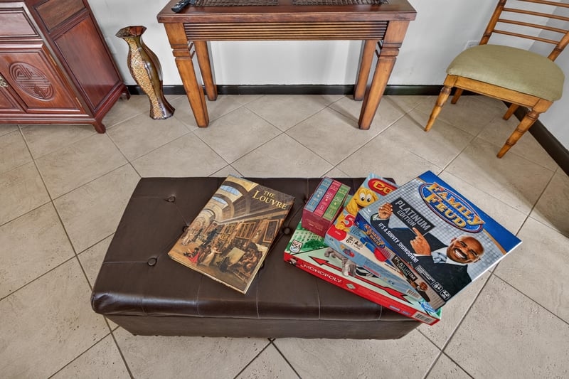 Dining table and leather bench at 6931 Cane Grass Ln E, Jacksonville, FL 32244
