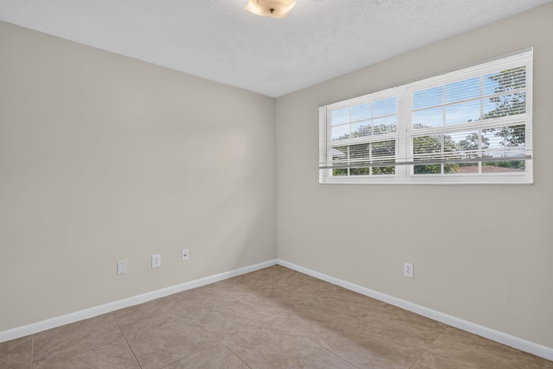 Bedroom with window at 9954 Larkdale Ct, Jacksonville, FL 32257