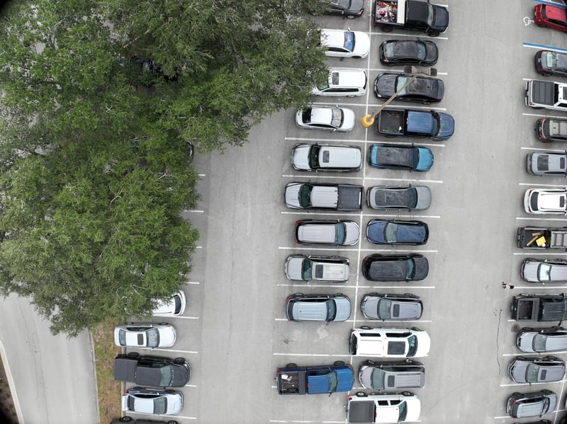 Aerial view of parking rows and shade tree at 9406 Atlantic Blvd, Jacksonville, FL 32225