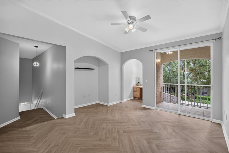 Empty room with window and hardwood flooring at 10075 Gate Pkwy unit 1905, Jacksonville, FL 32246