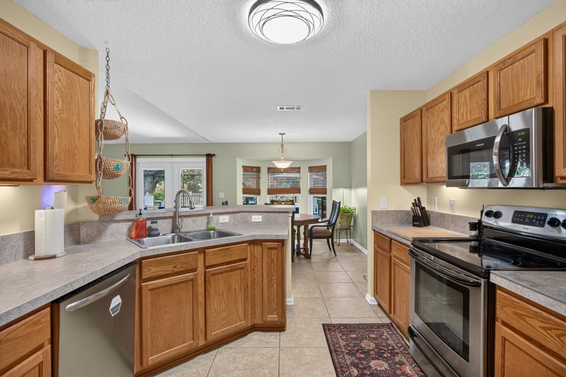 Kitchen sink with window view at 1589 Backwater Drive, Middleburg, FL 32068