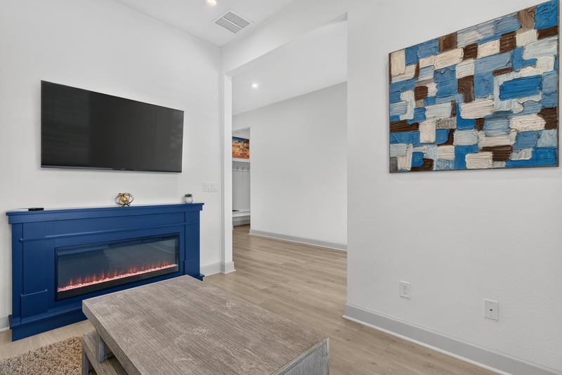 Living room with built-in electric fireplace and TV at 785 Back Creek Dr, St. Augustine, FL 32092
